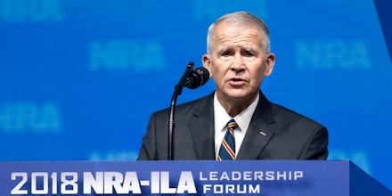 Former U.S. Marine Lt. Col. Oliver North gives the Invocation at the National Rifle Association-Institute for Legislative Action Leadership Forum in Dallas, Friday, May 4, 2018. (AP Photo/Sue Ogrocki)