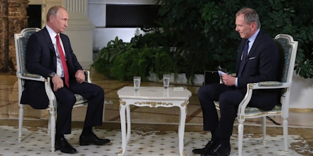 5519741 01.06.2018 June 1, 2018. Russian President Vladimri Putin during an interview with Armin Wolf, right, a journalist of the Austrian ORF TV and radio company, at the Kremlin. Mikhael Klimentyev / Sputnik  via AP