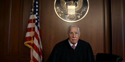Ninety-five year old Judge Robert Sweet in a courtroom.