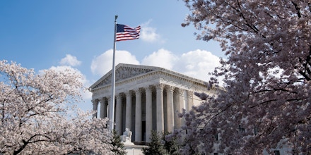 UNITED STATES - APRIL 10: Cherry blossoms frame the U.S. Supreme Court building in Washington on Tuesday, April 10, 2018. (Photo By Bill Clark/CQ Roll Call) (CQ Roll Call via AP Images)