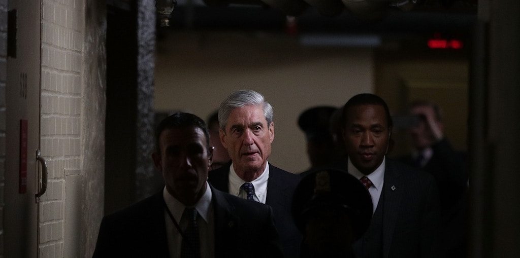 WASHINGTON, DC - JUNE 21:  Special counsel Robert Mueller (C) leaves after a closed meeting with members of the Senate Judiciary Committee June 21, 2017 at the Capitol in Washington, DC. The committee meets with Mueller to discuss the firing of former FBI Director James Comey.  (Photo by Alex Wong/Getty Images)