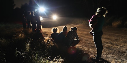 MCALLEN, TX - JUNE 12:  U.S. Border Patrol agents arrive to detain a group of Central American asylum seekers near the U.S.-Mexico border on June 12, 2018 in McAllen, Texas. The group of women and children had rafted across the Rio Grande from Mexico and were detained before being sent to a processing center for possible separation. Customs and Border Protection (CBP) is executing the Trump administration's 