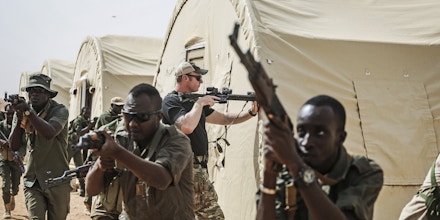 An American Special Forces soldier trains Nigerien troops during an exercise on the Air Base 201 compound, in Agadez, Niger, April 14, 2018. Hundreds of American troops are working feverishly to complete a $110 million airfield that will be used to strike extremists in West and North Africa, a region where most Americans have no idea the country is fighting. (Tara Todras-Whitehill/The New York Times)