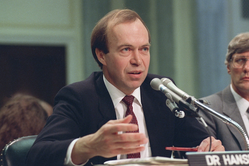 FILE - In this May 9, 1989 file photo, Dr. James Hansen, director of NASA's Goddard Institute for Space Studies in New York, testifies before a Senate Transportation subcommittee on Capitol Hill in Washington, D.C., a year after his history-making testimony telling the world that global warming was here and would get worse. (AP Photo/Dennis Cook, File)