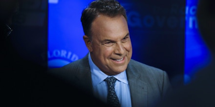 Democratic gubernatorial candidate Jeff Greene awaits the start of a debate ahead of the Democratic primary for governor, Thursday, Aug. 2, 2018, in Palm Beach Gardens, Fla. (AP Photo/Brynn Anderson)