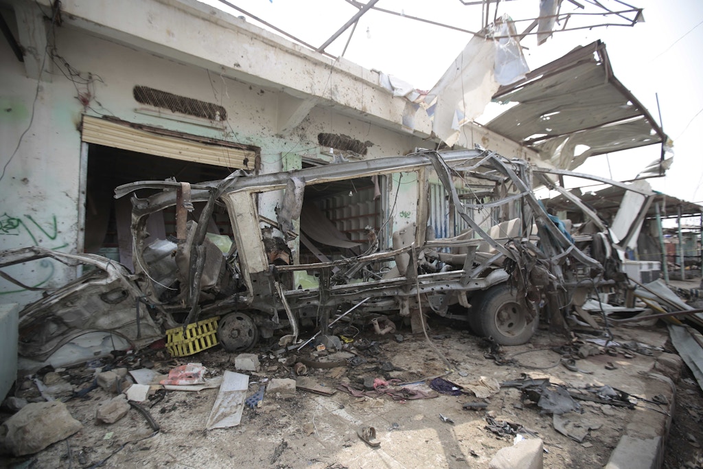 The wreckage of a bus remains at the site of a deadly Saudi-led coalition airstrike on Thursday, in Saada, Yemen, Sunday, Aug. 12, 2018. Yemen's shiite rebels are backing a United Nations' call for an investigation into the airstrike in the country's north that hit a bus carrying civilians, many of them school children in a busy market, killing dozens of people including many children. (AP Photo/Hani Mohammed)