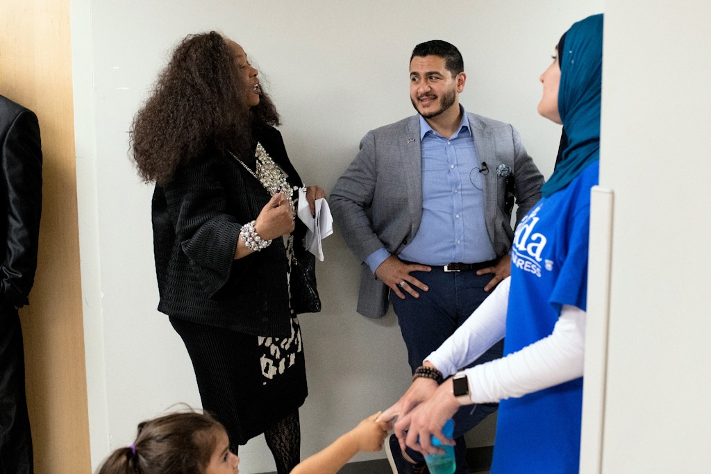 From left, Virgie Rollins, Chair of the Democratic National Committee (DNC) Black Caucus, talks to Michigan Democratic Gubernatorial candidate Abdul El-Sayed backstage during El-Sayed's campaign rally with Alexandria Ocasio-Cortez at the Wayne State University Student Center in Detroit, Michigan on Saturday, July 28, 2018. (Rachel Woolf for The Intercept)