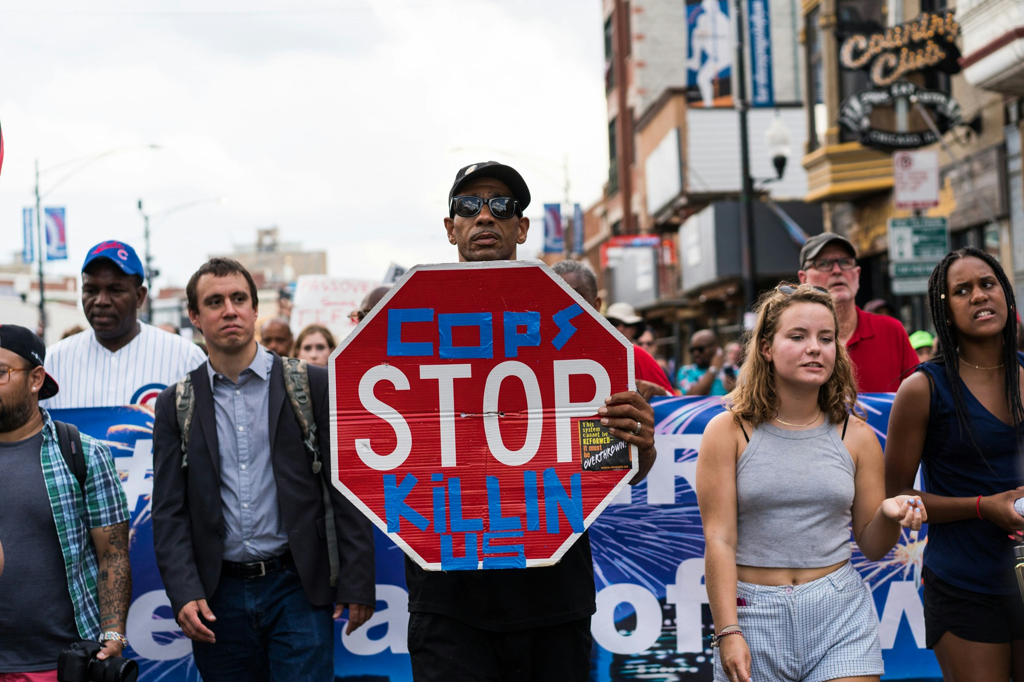 Demonstrators march down Clark Street towards Wrigley Field in a protest against gun violence in Chicago on August 2, 2018. Organizers of the march are calling for the resignation of Mayor Rahm Emanuel and Chicago Police Superintendent Eddie Johnson and want to bring attention to gun violence and poverty on the South and West Sides of Chicago. (Photo by Max Herman/NurPhoto via Getty Images)