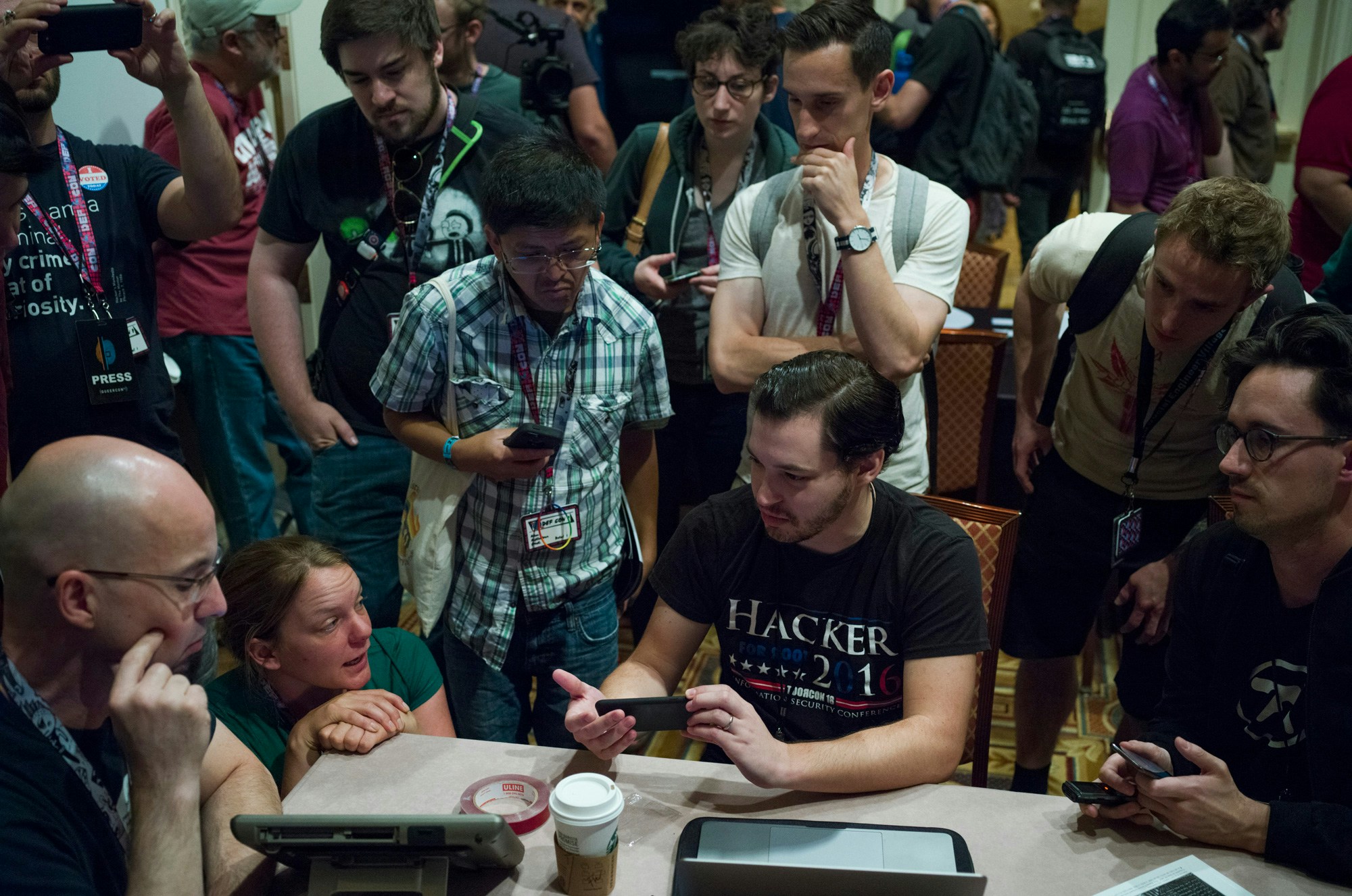 Hackers are let loose on a series of computerized voting machines during an event at Def Con in Las Vegas, July 28, 2017. An exemption to the Digital Millennium Copyright Act gave the researchers a temporary pass to experiment on voting machines. If there's a single lesson Americans have learned from the events of the past year, it might be this: Hackers are dangerous people. But what if the problem we face is not too many black-hat hackers, but too few white-hat ones? (Mark Ovaska/The New York Times)