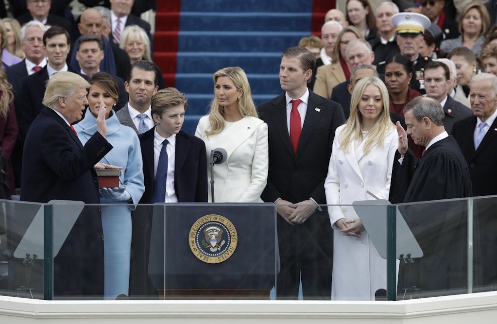 2017 AP YEAR END PHOTOS - Donald Trump is sworn in as the 45th president of the United States by Chief Justice John Roberts, as Melania Trump and his family looks on during the 58th Presidential Inauguration at the U.S. Capitol in Washington, on Jan. 20, 2017. (AP Photo/Patrick Semansky)