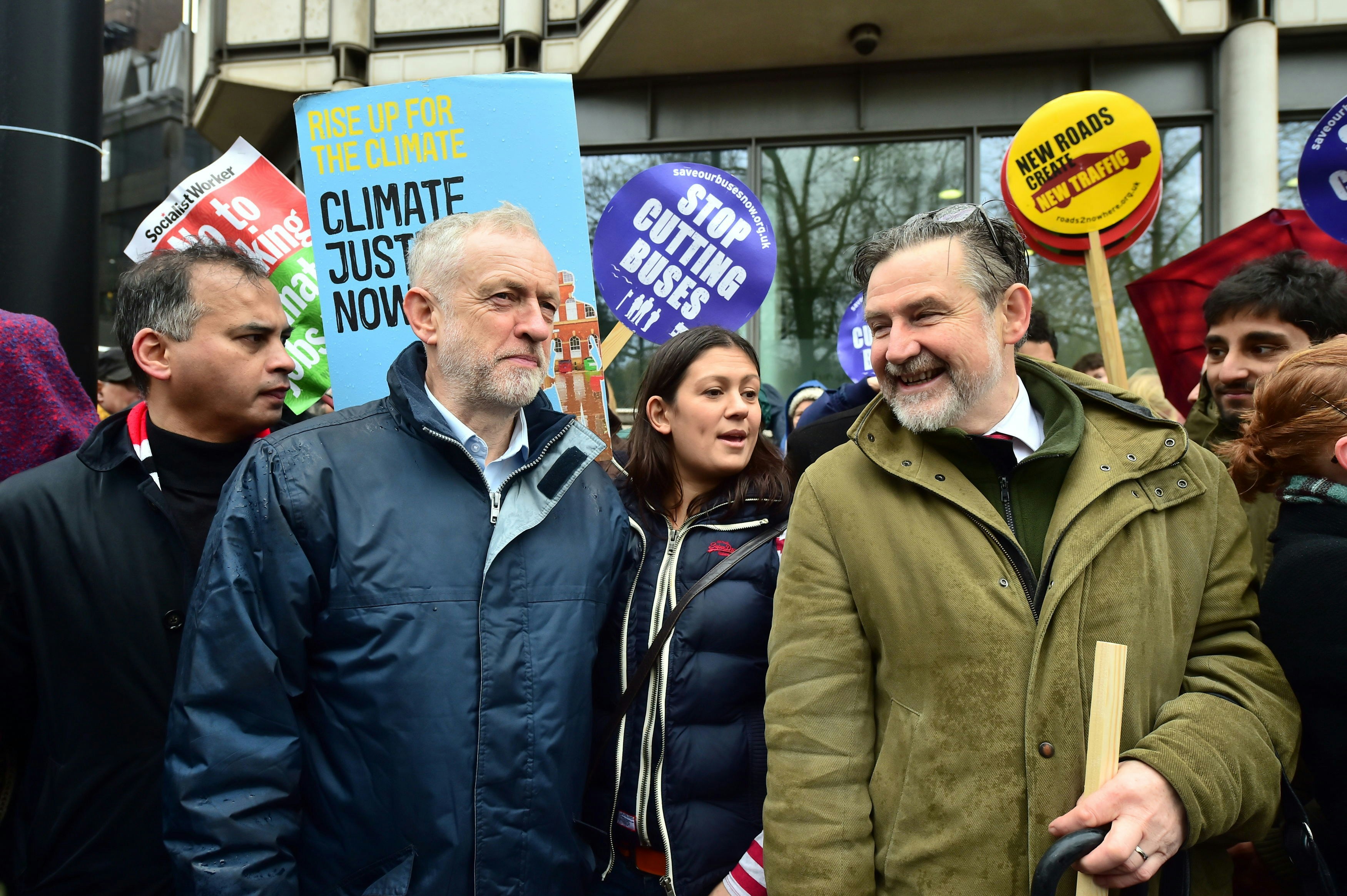 Climate March - London. Labour Party leader Jeremy Corbyn (second left) attends the march through London calling for ambitious action to tackle climate change. Picture date: Sunday November 29, 2015. Campaigners want the Government and other countries to agree a deal that will shift the world to 100% renewable energy and protect people from the impacts of climate change. See PA story ENVIRONMENT Climate. Photo credit should read: Dominic Lipinski/PA Wire URN:24892318