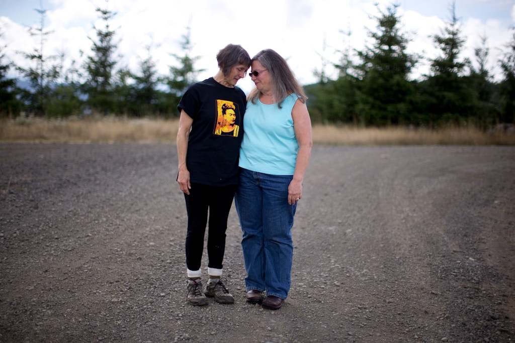 OREGON COAST, OR - SEPTEMBER 8: Barbara Davis, left, gathers support from Debra Fant, right, after becoming emotional at the sight of clear cutting of old growth timber along the coastal mountain range of Oregon. The two are part of the group Lincoln County Community Rights, who were able to get an ordinance passed to stop the aerial spraying of pesticides. September 8, 2018 (Photo by Beth Nakamura For The Intercept)