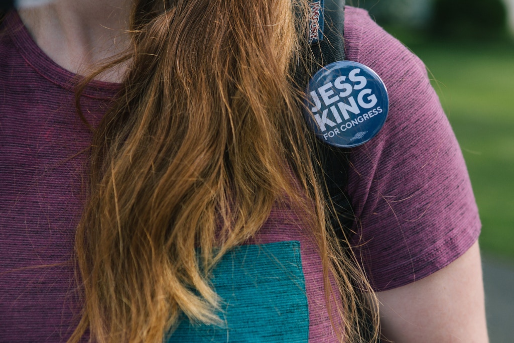 A campaign button for Congressional candidate Jess King is seen on canvassing volunteer Liz Hollcraft in Mount Joy, Pennsylvania on Saturday, August 18, 2018. King, who lives in nearby Lancaster, is running for Congress in Pennsylvania's 11th District.(Michelle Gustafson for The Intercept)