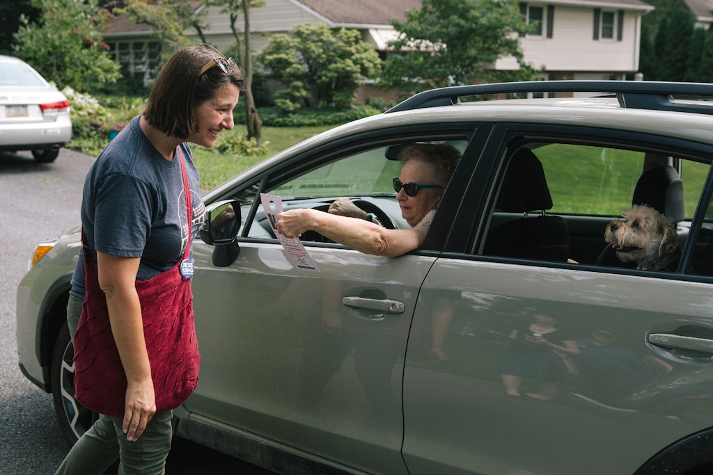 Congressional candidate Jess King speaks with Mount Joy resident P. Sinclair-Bairos while out canvassing in Mount Joy, Pennsylvania on Saturday, August 18, 2018. King, who lives in nearby Lancaster, is running for Congress in Pennsylvania's 11th District.(Michelle Gustafson for The Intercept)