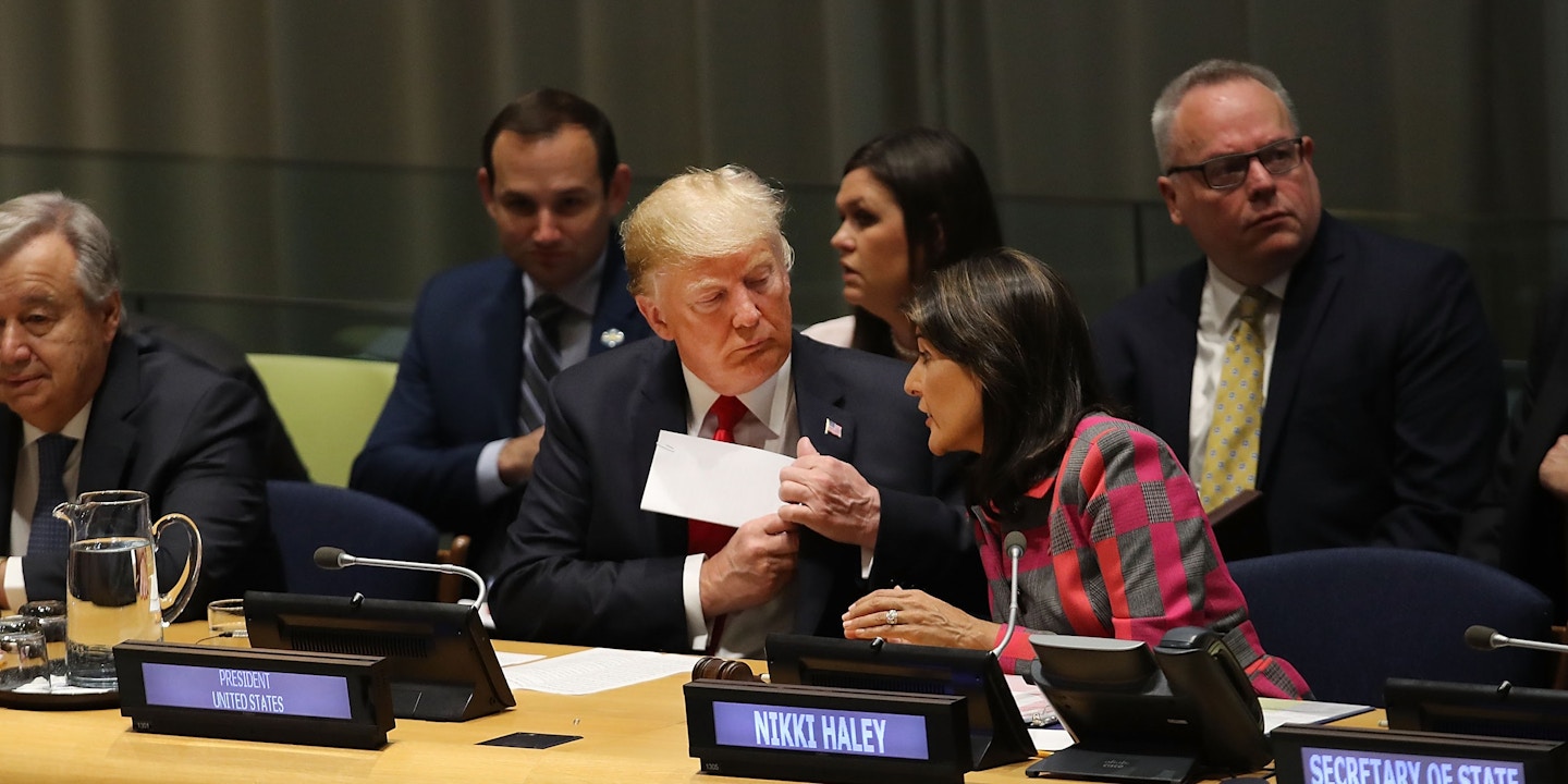 NEW YORK, NY - SEPTEMBER 24:  President Donald Trump attends a meeting on the global drug problem at the United Nations (UN) with UN Ambassador Nikki Haley a day ahead of the official opening of the 73rd United Nations General Assembly on September 24, 2018 in New York City. The UN General Assembly, or UNGA, is expected to draw 84 heads of state and 44 heads of government in New York City for a week of speeches, talks and high level diplomacy concerning global issues. New York City is under tight security for the annual event with dozens of road closures and thousands of security officers patrolling city streets and waterways.  (Photo by Spencer Platt/Getty Images)