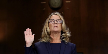 WASHINGTON, DC - SEPTEMBER 27:  Christine Blasey Ford is sworn in before testifying the Senate Judiciary Committee in the Dirksen Senate Office Building on Capitol Hill September 27, 2018 in Washington, DC. A professor at Palo Alto University and a research psychologist at the Stanford University School of Medicine, Ford has accused Supreme Court nominee Judge Brett Kavanaugh of sexually assaulting her during a party in 1982 when they were high school students in suburban Maryland. In prepared remarks, Ford said, ÒI donÕt have all the answers, and I donÕt remember as much as I would like to. But the details about that night that bring me here today are ones I will never forget. They have been seared into my memory and have haunted me episodically as an adult.Ó  (Photo by Win McNamee/Getty Images)