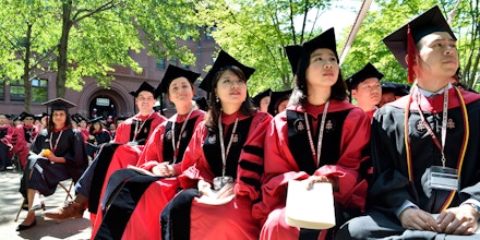 CAMBRIDGE, MA - MAY 24:  Students attend at the Harvard University 2018 367th Commencement exercises at Harvard University on May 24, 2018 in Cambridge, Massachusetts.  Receiving Honorary Degrees in 2018 are Sallie Chisholm, Rita Dove, Harvey Fineberg, Ricardo Lagos, George Lewis, Twyla Tharp and Wong Kar Wai. Representative John Lewis also attended.  (Photo by Paul Marotta/Getty Images)
