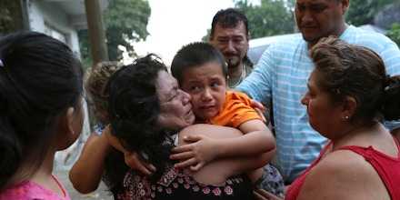 Family members embrace Leo Jeancarlo de Leon, 6, after he returned home from the U.S. on Aug. 8, 2018 near San Marcos, Guatemala. He had been separated from his mother, Lourdes de Leon, for nearly three months after they were taken into custody by the U.S. Border Patrol. Lourdes was deported and Leo was held at the Cayuga Centers in New York City until he was flown back to Guatemala with 8 other children on June 7.