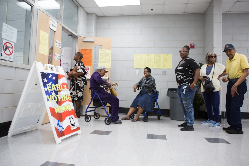 ATLANTA, GA - OCTOBER 18: Voters wait in line to early vote at C.T. Martin Natatorium and Recreation Center on October 18, 2018 in Atlanta, Georgia.  Early voting started in Georgia on October 15th.  Georgia's Gubernatorial election is a close race between Democratic candidate Stacey Abrams and Republican candidate Brian Kemp.  (Photo by Jessica McGowan/Getty Images)
