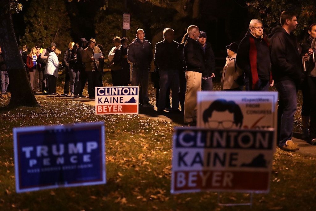 ALEXANDRIA, VA - NOVEMBER 08:  Voters wait in-line for casting their ballots outside a polling place on Election Day November 8, 2016 in Alexandria, Virginia. Americans across the nation are picking their choice for the next president of the United States.  (Photo by Alex Wong/Getty Images)