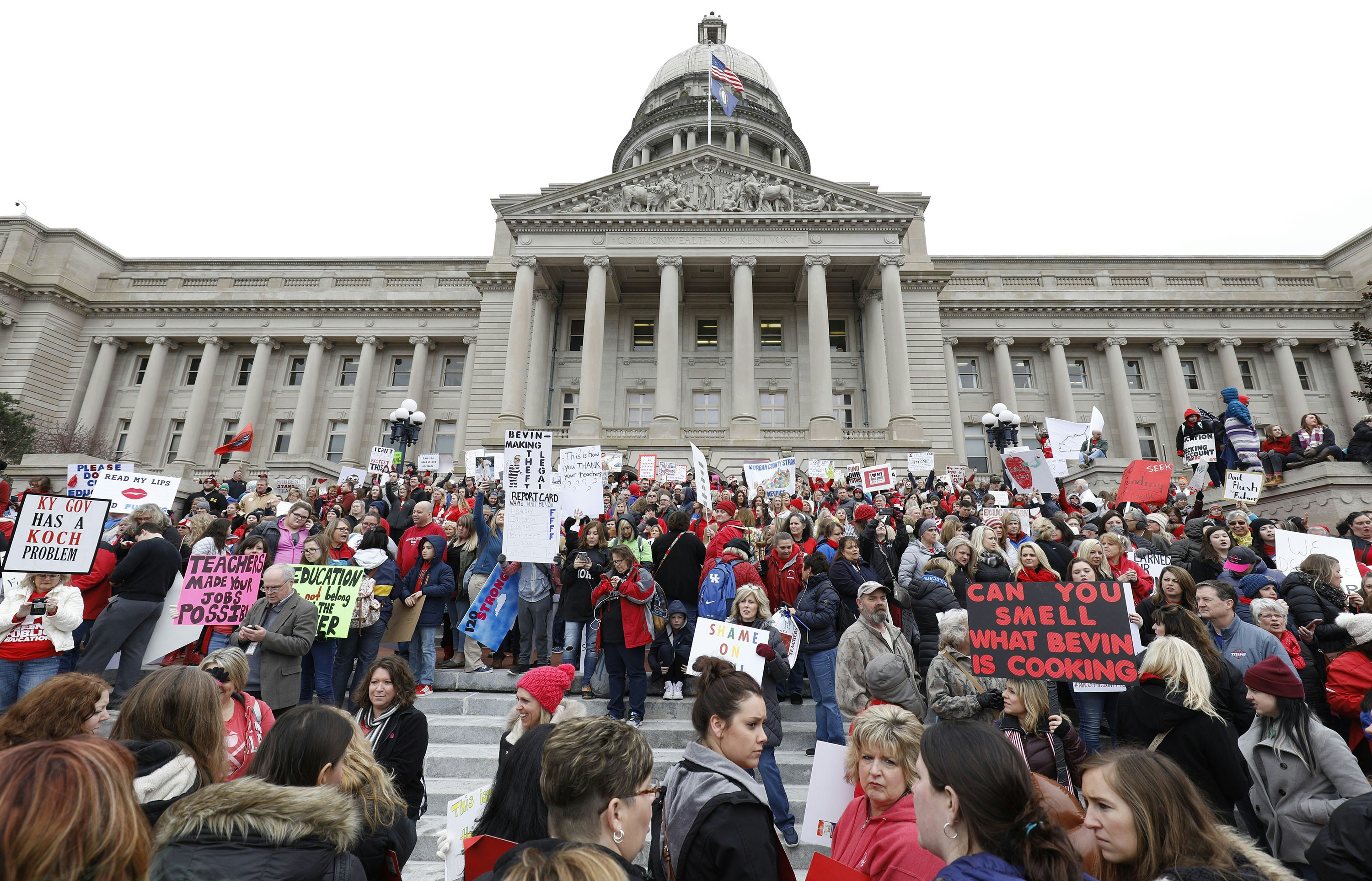 FRANKFORT, KY - APRIL 2: Thousands of public school teachers and their supporters protest against a pension reform bill at the Kentucky State Capitol April 2, 2018 in Frankfort, Kentucky. The teachers are calling for higher wages and are demanding that Kentucky Gov. Matt Bevin veto a bill that overhauls their pension plan. (Photo by Bill Pugliano/Getty Images)