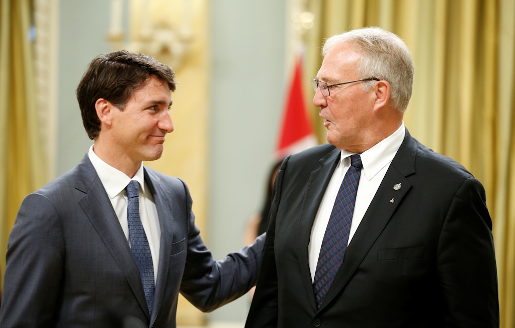 Canada's Prime Minister Justin Trudeau congratulates Bill Blair after he was sworn-in as Minister of Border Security and Organized Crime Reduction during a cabinet shuffle at Rideau Hall in Ottawa, Ontario, Canada, July 18, 2018. REUTERS/Chris Wattie - RC182BD57630