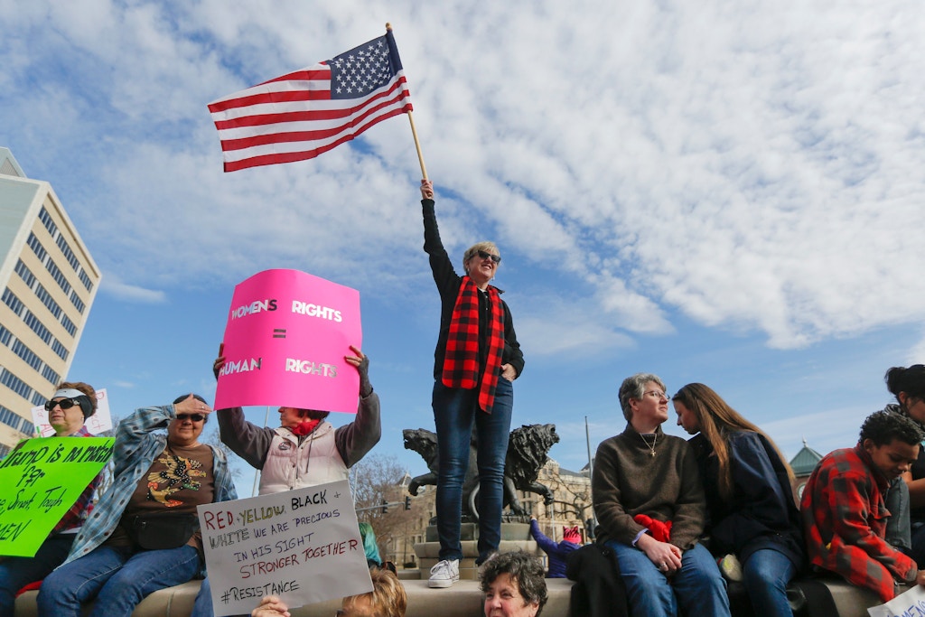 Several thousand people turned out at the Keeper of the Plains on Saturday, Jan. 21, 2017, to take part in the Women's March in Wichita, Kan. Similar events were held across the globe, with an estimated 500,000 turning out in Washington, DC. (Travis Heying/The Wichita Eagle via AP)