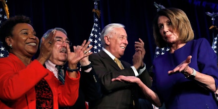 House Minority Leader Nancy Pelosi of Calif., right, dances to the music as she steps away from the podium past Rep. Barbara Lee, D-Calif., far left, Congressional Black Caucus Chairman Rep. G.K. Butterfield, D-N.C., and House Minority Whip Steny Hoyer, D-Md., after speaking about Democratic wins in the House of Representatives to a crowd of Democratic supporters during an election night returns event at the Hyatt Regency Hotel, on Tuesday, Nov. 6, 2018, in Washington. (AP Photo/Jacquelyn Martin)