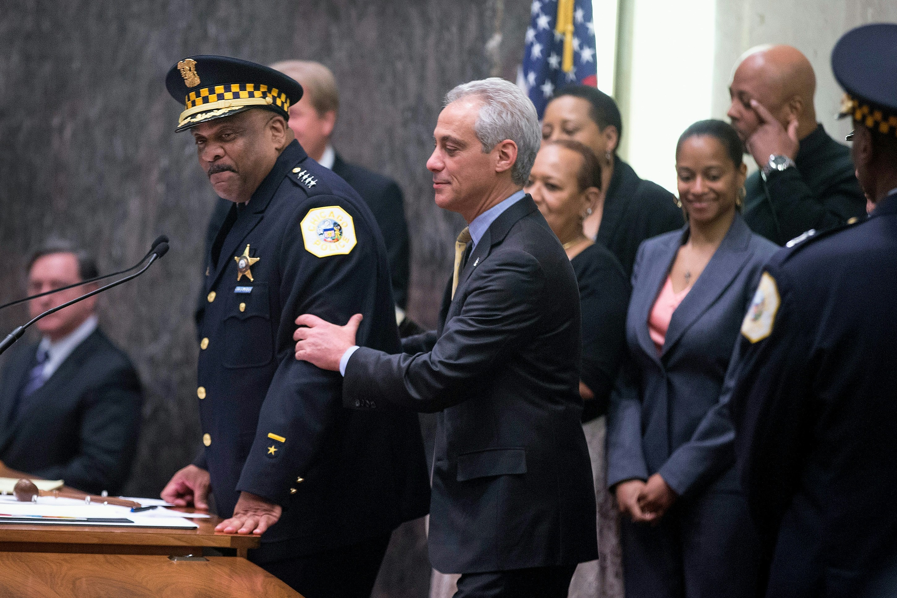 CHICAGO, IL - APRIL 13: Eddie Johnson (L) speaks to the City Council with Mayor Rahm Emanuel (C) by his side after being sworn in as Chicago Police Superintendent on April 13, 2016 in Chicago, Illinois. Johnson had been acting as interim Police Superintendent after some maneuvering by Emanuel who rejected the candidates selected for the job by the Chicago Police Board.  (Photo by Scott Olson/Getty Images)