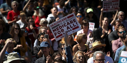 SAN FRANCISCO, CA - SEPTEMBER 22:  Supporters hold signs as U.S. Sen. Bernie Sanders (I-VT) speaks during a health care rally at the  2017 Convention of the California Nurses Association/National Nurses Organizing Committee on September 22, 2017 in San Francisco, California. Sen. Bernie Sanders addressed the California Nurses Association about his Medicare for All Act of 2017 bill.  (Photo by Justin Sullivan/Getty Images)