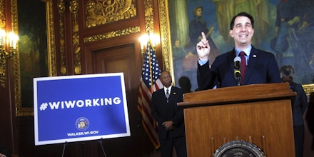 Gov. Scott Walker describes his proposal to reduce food stamp benefits for parents who do not work at least 80 hours a month or meet other requirements to get trained for a job and apply for work, Monday, Jan. 23, 2017, in Madison, Wis. (AP Photo/Scott Bauer)