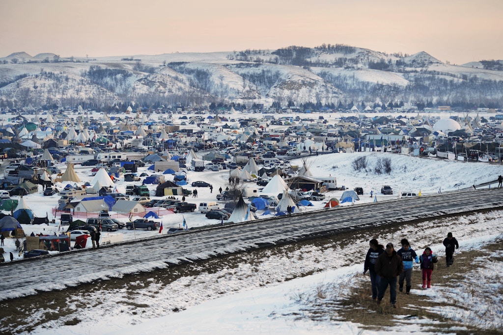 FILE - This Dec. 3, 2016, file photo shows the Oceti Sakowin camp where people have gathered to protest the Dakota Access oil pipeline near Cannon Ball, N.D. The first seasonal flood outlook from the National Weather Service indicates minor spring flooding is almost certain in the area of southern North Dakota where pipeline opponents are camping. The Friday, Jan. 27, 2017, outlook says there's little chance of major flooding but that parts of the camp area could be under water. (AP Photo/David Goldman, File)