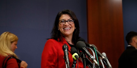 Rep.-elect Rashida Tlaib, D-Mich., pauses to speak to media as she walks from member-elect briefings and orientation on Capitol Hill in Washington, Thursday, Nov. 15, 2018. (AP Photo/Carolyn Kaster)