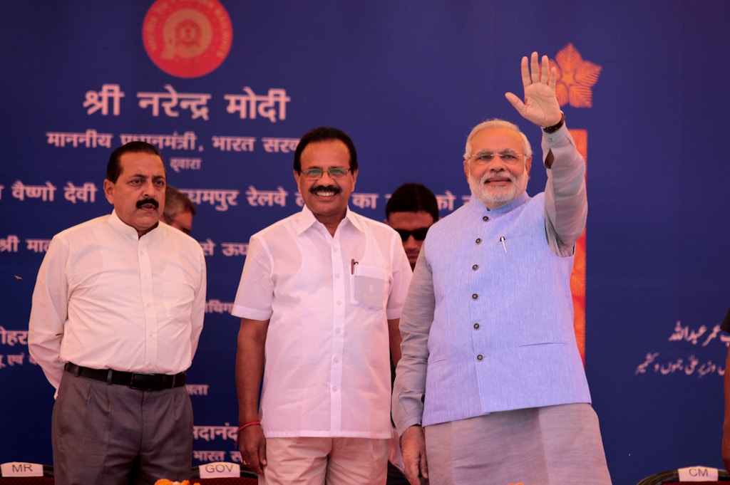 JAMMU, INDIA - JULY 4: (R- L) Prime Minister Narendra Modi with Railway Minister Sadananda Gawda and Minister of State Jitender Singh during the inauguration ceremony at Katra railway station on July 4, 2014 in Katra, about 45 kms from Jammu.  Prime Minister Narendra Modi today flagged off Shri Shakti Express, the first train on Katra-Udhampur line from Katra railway station, facilitating pilgrims to visit Mata Vaishno Devi shrine. (Photo by Nitin Kanotra/Hindustan Times via Getty Images)