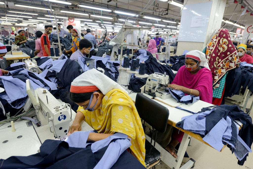 BANGLADESH, DHAKA - JUNE 17 : The capital city of Dhaka. Textile factory in Savar, in the suburbs of Dhaka where work about six thousands employees. Dhaka is the capital of Bangladesh in June 17, 2015 in Dhaka, Bangladesh (Photo by Frédéric Soltan /Corbis via Getty Images)
