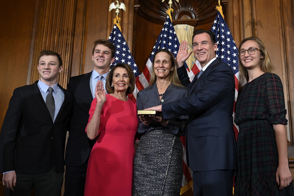 House Speaker Nancy Pelosi of Calif., third from left, poses during a ceremonial swearing-in with Rep. Tom Suozzi, D-N.Y., second from right, on Capitol Hill in Washington, Thursday, Jan. 3, 2019, during the opening session of the 116th Congress. (AP Photo/Susan Walsh)