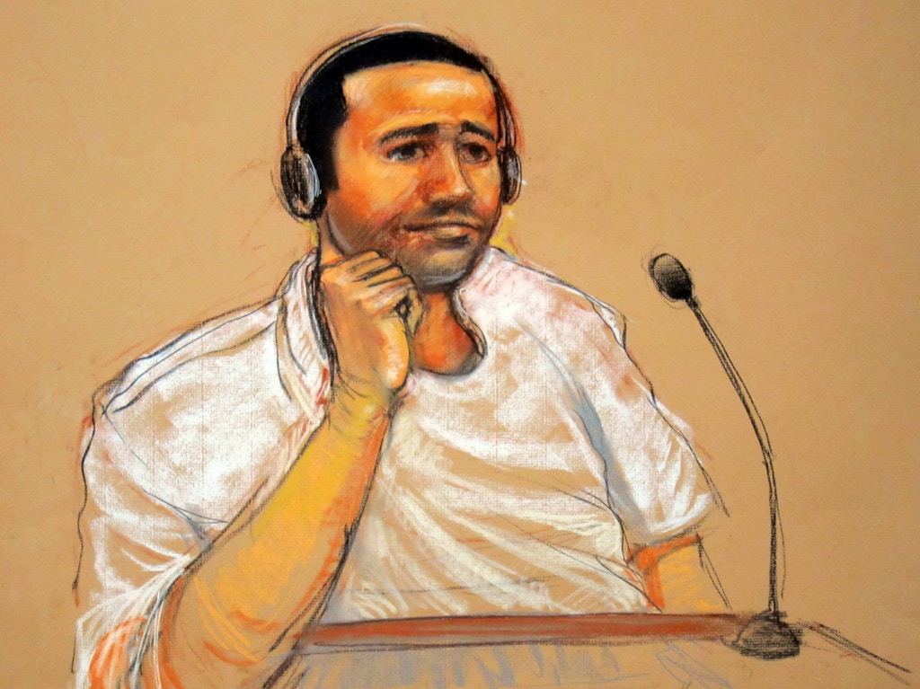 FILE - This Nov. 9, 2011, file artist rendering by courtroom artist Janet Hamlin, reviewed by the U.S. military, shows Abd al Rahim al-Nashiri during his military commissions arraignment at the Guantanamo Bay detention center in Guantanamo, Cuba. Nashiri, accused of orchestrating the 2000 bombing of the USS Cole, is pressing his demand for documents detailing his treatment while he was held for several years in secret CIA prisons. His lawyers are asking a U.S. military judge Monday, Aug. 4, 2014, to set a deadline for prosecutors to turn over the documents. (AP Photo/Janet Hamlin, File)