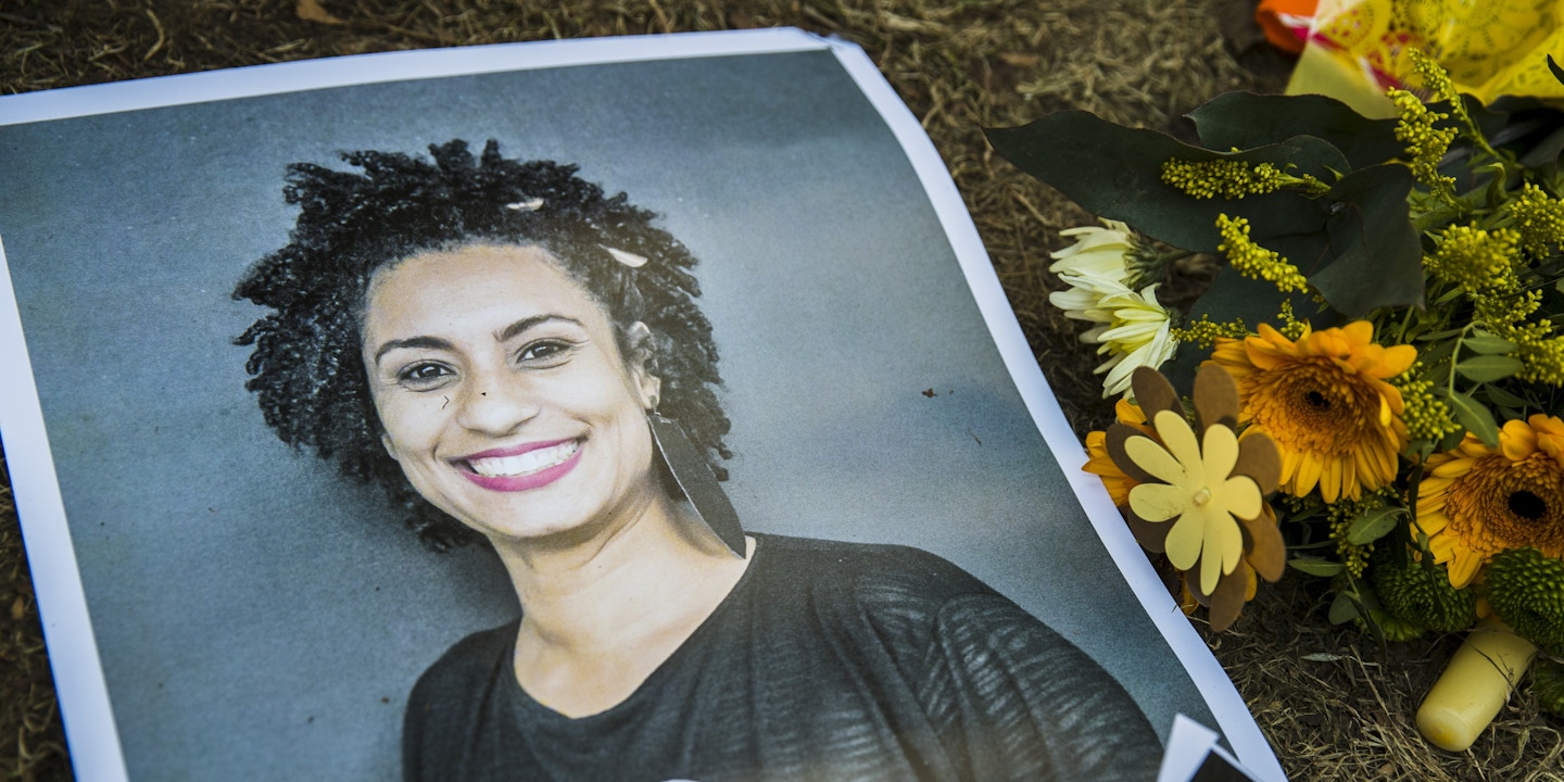 A makeshift memorial is pictured during a protest of Brazilian expats against the killing of Rio de Janeiro's left councilwoman and activist Marielle Franco in Berlin, Germany on March 18, 2018. Marielle Franco, who criticised openly racism and police brutality, was shot with his driver Anderson Pedro Gomes in the city center of Rio de Janeiro in the evening of March 14, 2018. (Photo by Emmanuele Contini/NurPhoto via Getty Images)