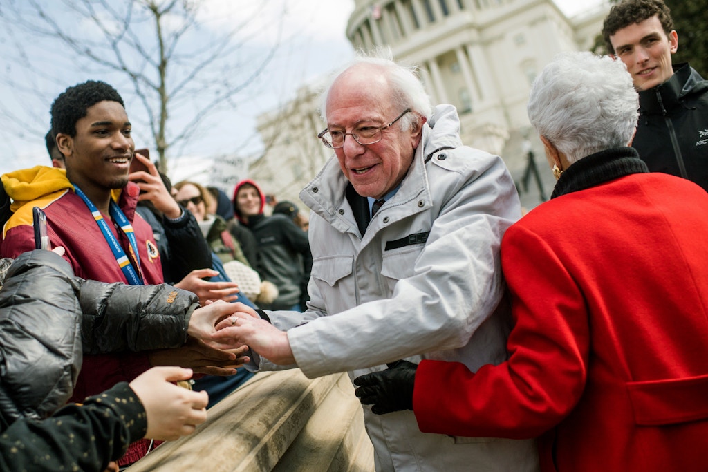 UNITED STATES - MARCH 14: Sen. Bernie Sanders, I-Vt., and Rep. Grace Napolitano, D-Calif., greet students while attending a rally on the West Front of the Capitol to call on Congress to act on gun violence prevention during a national walkout by students on March 14, 2018. (Photo By Tom Williams/CQ Roll Call) (CQ Roll Call via AP Images)