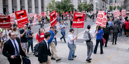 Union activists and supporters rally against the Supreme Court's ruling in the Janus v. AFSCME case, in Foley Square in Lower Manhattan, June 27, 2018 in New York City. In a 5-4 decision, the Supreme Court ruled on Wednesday that public employee unions cannot require non-members to pay fees. The ruling will have significant financial impacts for organized labor. (Photo by Karla Ann Cote/NurPhoto/Sipa USA)(Sipa via AP Images)