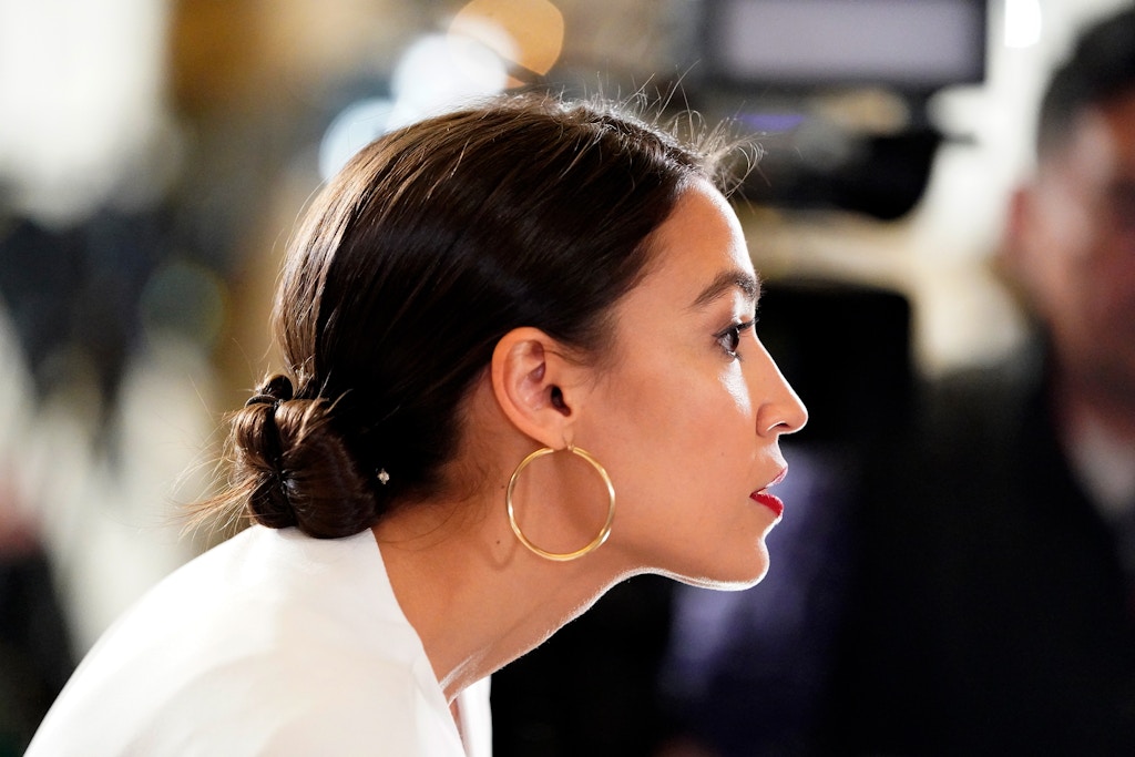 Rep. Alexandria Ocasio-Cortez, D-N.Y., arrives to hear President Donald Trump deliver his State of the Union address to a joint session of Congress on Capitol Hill in Washington, Tuesday, Feb. 5, 2019. (AP Photo/Carolyn Kaster)