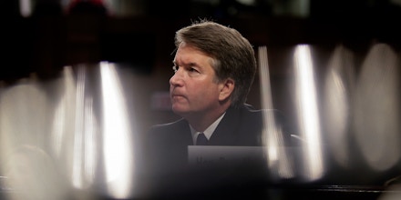 WASHINGTON, DC - SEPTEMBER 4: Judge Brett Kavanaugh listens to opening statements during his Supreme Court confirmation hearing before the Senate Judiciary Committee in the Hart Senate Office Building on Capitol Hill, September 4, 2018 in Washington, DC. Kavanaugh was nominated by President Donald Trump to fill the vacancy on the court left by retiring Associate Justice Anthony Kennedy. (Photo by Drew Angerer/Getty Images)