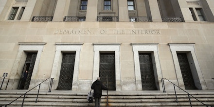 WASHINGTON, DC - JANUARY 28: A worker arrives at the Department of Interior on January 28, 2019 in Washington, DC. Last Friday President Donald Trump signed a temporary measure to reopen the U.S. government after it was partially shut down for 35 days as the president and congressional Democrats could not come to a bipartisan solution for more money to build a wall along the U.S.-Mexico border.  (Photo by Mark Wilson/Getty Images)
