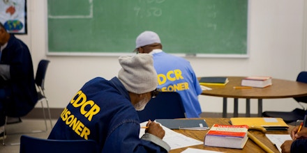 Inmates take a test as part of an educational program at the Richard J. Donovan Correctional Facility in San Diego, California, U.S., on Wednesday, March 26, 2014. California is under a federal court order to lower the population of its prisons to 137.5 percent of their designed capacity after the U.S. Supreme Court upheld a ruling that inmate health care was so bad it amounted to cruel and unusual punishment. Photographer: Sam Hodgson/Bloomberg via Getty Images