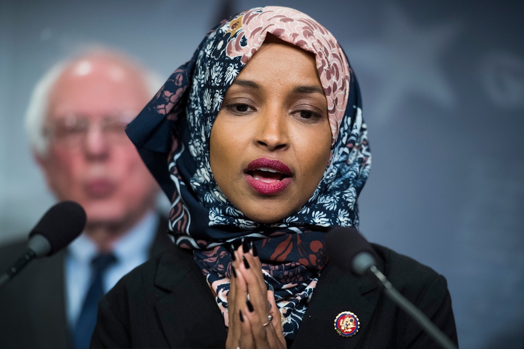 UNITED STATES - JANUARY 10: Rep. Ilhan Omar, D-Minn., and Sen. Bernie Sanders, I-Vt., conduct a news conference in the Capitol to introduce a legislative package that would lower prescription drug prices in the U.S. on January 10, 2019. (Photo By Tom Williams/CQ Roll Call) (CQ Roll Call via AP Images)