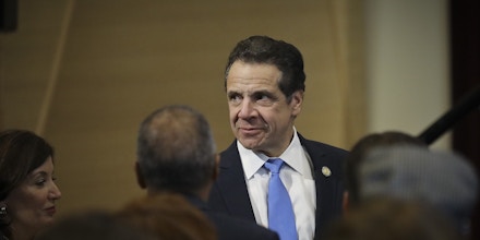 New York Gov. Andrew Cuomo arrives for a ceremony to sign an anti-discrimination bill into law, Friday Jan. 25, 2019 in New York. New York state added gender identity and gender expression to the state's anti-discrimination law, making it illegal to deny people a job, housing, education or public accommodations because they are transgender. (AP Photo/Bebeto Matthews)
