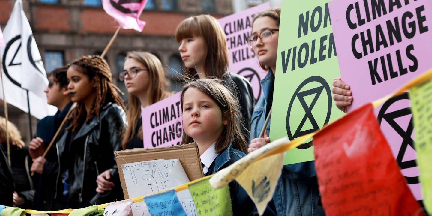 The protest group Extinction Rebellion stage a protest of fake blood in front of Downing Street 10, 9th March 2019, Central London, United Kingdom. Young women and girls form the front of the march down Whitehall. Whitehall was closed for traffic while the group staged their 'Our Children's Blood' action where they poured hundreds of litres of fake blood across the road. After the blood was spilt a number of speakers, including children spoke of their fears of the future where man made climate change could have a devastating effect on the planet and human life. The group Extinction Rebellion is a movement which wants to force the Government to introduce radical climate change policies using civil disobedience and mass arrests. (photo by Kristian Buus/In Pictures via Getty Images)T