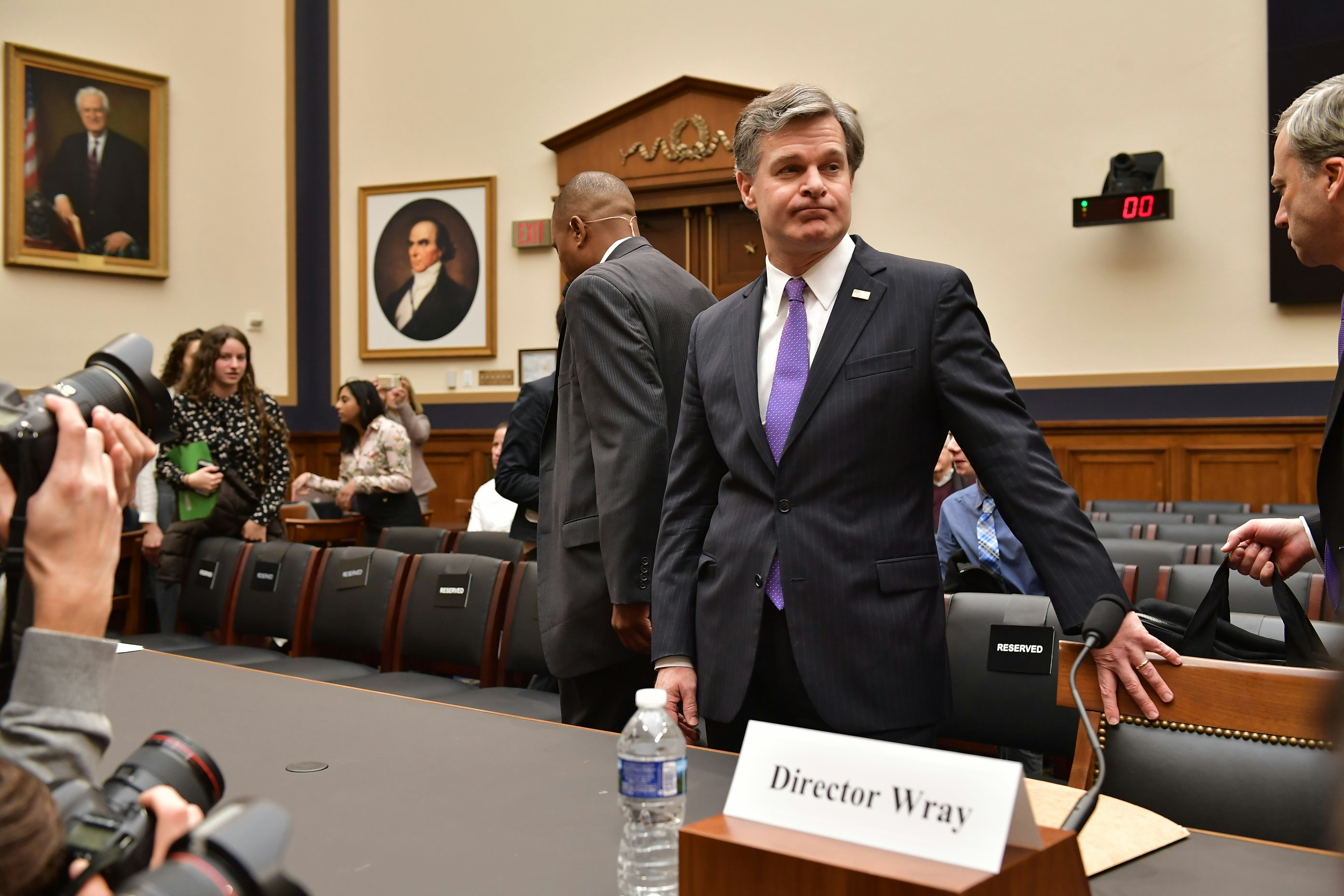 FBI Director Christopher Wray arrives to testify before the House Judiciary Committee  on oversight of the Federal Bureau of Investigation in the Rayburn House Office Building in Washington, DC on December 7, 2017.  / AFP PHOTO / MANDEL NGAN        (Photo credit should read MANDEL NGAN/AFP/Getty Images)