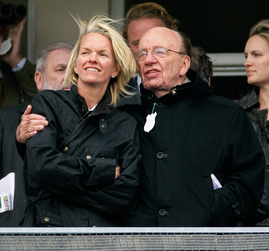 CHELTENHAM, UNITED KINGDOM - MARCH 18: (EMBARGOED FOR PUBLICATION IN UK NEWSPAPERS UNTIL 48 HOURS AFTER CREATE DATE AND TIME) Elisabeth Murdoch hugs her father Rupert Murdoch as they watch the racing on day 3 of the Cheltenham Horse Racing Festival on March 18, 2010 in Cheltenham, England. (Photo by Indigo/Getty Images)