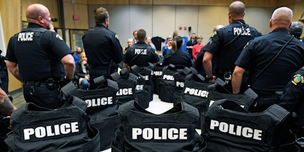 GOLDEN, CO - NOVEMBER 15:  New high end police body armor kits sit on tables before being given to members of the Golden Police department  by Shield 616 inside the Golden city council chambers on November 15, 2018 in Golden, Colorado. The kit comes with two armor plates, one for the front and one for the back, a ballistic helmet, which only stops hand gun bullets, an individual trauma aid kit  and a vest in which to put the plates.  Shield 616, a Colorado Springs non-profit that provides enhanced body armor kits to police officers, presented 26 kits to the Golden Police department. Former Colorado Springs police officer Jake Skifstad responded to the shooting at the New Life church in 2007 that killed two and injured five. After the suspect was killed, Skifstad was assigned to guard the body. Reflecting on the situation as he stood guard he realized the armor he was wearing would only stop handgun fire and this shooter had a rifle. Out of that he started Shield 616 which supplies enhanced armor that will withstand rifle fire. Each kit costs about $2500. (Photo by Helen H. Richardson/The Denver Post via Getty Images)
